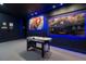 Fun game room with air hockey and artwork at 171 Burma St, Kissimmee, FL 34747