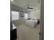 Bright and airy bedroom with a comfortable bed and ceiling fan at 7416 Soiree Way, Reunion, FL 34747
