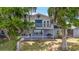 Two story house with a balcony and a deck at 1149 Shady Cove E Rd, Haines City, FL 33844