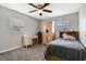 Cozy bedroom featuring a desk, wooden wardrobe, and twin bed at 1149 Shady Cove E Rd, Haines City, FL 33844