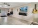 Living room featuring a TV and tile floors at 1149 Shady Cove E Rd, Haines City, FL 33844