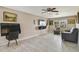 Living room with gray couch and lake view at 1149 Shady Cove E Rd, Haines City, FL 33844