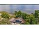 Stunning aerial view of lakefront home with private dock at 1149 Shady Cove E Rd, Haines City, FL 33844