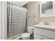Clean bathroom with white vanity and shower/tub combo at 1149 Shady Cove E Rd, Haines City, FL 33844