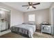 Bedroom with gray bedding and access to a deck at 1149 Shady Cove E Rd, Haines City, FL 33844