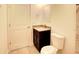 Bathroom with granite countertop and toilet at 6952 Sw 152Nd St, Ocala, FL 34473