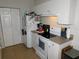 Kitchen with white appliances and ample counter space at 824 Grand Regency Pt # 102, Altamonte Springs, FL 32714