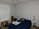 Bedroom with a double bed and nightstands at 824 Grand Regency Pt # 102, Altamonte Springs, FL 32714