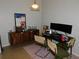 Dining area with a mid-century modern table and four chairs at 824 Grand Regency Pt # 102, Altamonte Springs, FL 32714