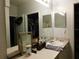 Bathroom with double vanity and a large mirror at 824 Grand Regency Pt # 102, Altamonte Springs, FL 32714