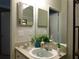 Bathroom vanity with sink and two mirrors at 824 Grand Regency Pt # 102, Altamonte Springs, FL 32714