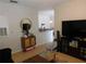 Living room with TV, furniture, and view to kitchen at 824 Grand Regency Pt # 102, Altamonte Springs, FL 32714