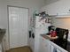 View of kitchen with stove, refrigerator, and pantry at 824 Grand Regency Pt # 102, Altamonte Springs, FL 32714