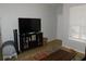 Living room featuring a large TV and ample space at 824 Grand Regency Pt # 102, Altamonte Springs, FL 32714