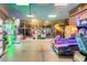 Fun filled game room with various arcade games at 244 Capri Dr, Davenport, FL 33897