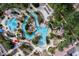 Large resort-style pool with water features and lounge chairs at 244 Capri Dr, Davenport, FL 33897