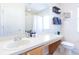 Large bathroom with double sinks, a shower, and a toilet at 244 Capri Dr, Davenport, FL 33897