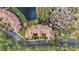 Top-down view of a condo building and surrounding parking lot at 8801 Worldquest Blvd # 4406, Orlando, FL 32821