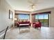Spacious living room with view and comfortable seating at 8801 Worldquest Blvd # 4406, Orlando, FL 32821