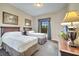 Spacious bedroom with two twin beds and a dresser at 8801 Worldquest Blvd # 4406, Orlando, FL 32821