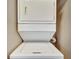 Convenient stackable washer and dryer in closet at 8801 Worldquest Blvd # 4406, Orlando, FL 32821