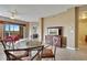 Living room with a red couch and access to balcony at 8801 Worldquest Blvd # 4406, Orlando, FL 32821