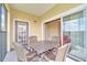 Private balcony with table and chairs, great for relaxing at 8801 Worldquest Blvd # 4406, Orlando, FL 32821