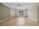Spacious living room with tile floors and ceiling fan at 3651 N Goldenrod Rd # B107, Winter Park, FL 32792