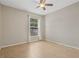 Spacious bedroom with tile floor and ceiling fan at 3651 N Goldenrod Rd # B107, Winter Park, FL 32792
