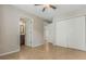 Bedroom with tile floors, double door closet and access to bathroom at 3651 N Goldenrod Rd # B107, Winter Park, FL 32792