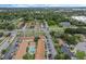 Aerial image of apartment complex with pool, parking, and surrounding area at 3651 N Goldenrod Rd # B107, Winter Park, FL 32792