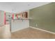 Kitchen with wood cabinets and breakfast bar at 3651 N Goldenrod Rd # B107, Winter Park, FL 32792