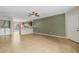 Open living area with kitchen and laundry access at 3651 N Goldenrod Rd # B107, Winter Park, FL 32792