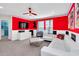 Fun Mickey Mouse themed bedroom, featuring a sectional and large TV at 1870 Summer Dr, Davenport, FL 33897