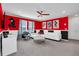 Mickey Mouse themed room with sectional sofa and large TV at 1870 Summer Dr, Davenport, FL 33897