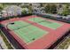Two well-maintained tennis courts at 334 Chadwick Dr, Davenport, FL 33837