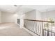 Spacious loft area overlooking the entryway at 334 Chadwick Dr, Davenport, FL 33837