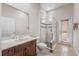 Bathroom with shower, toilet and single vanity at 334 Chadwick Dr, Davenport, FL 33837