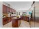 Large kitchen with granite countertops and stainless steel appliances at 334 Chadwick Dr, Davenport, FL 33837