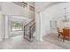 Two-story foyer with a view of the living room and dining area at 334 Chadwick Dr, Davenport, FL 33837