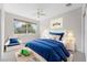 bedroom with blue bedding and toys at 334 Chadwick Dr, Davenport, FL 33837