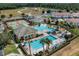Resort-style community pool with tennis courts at 334 Chadwick Dr, Davenport, FL 33837