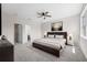 Main bedroom with king-size bed and ensuite bathroom access at 334 Chadwick Dr, Davenport, FL 33837
