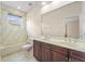 Bathroom with double vanity and a tub at 334 Chadwick Dr, Davenport, FL 33837
