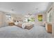 Spacious main bedroom with ample natural light and sitting area at 334 Chadwick Dr, Davenport, FL 33837