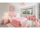 bedroom with pink furniture and decor at 334 Chadwick Dr, Davenport, FL 33837