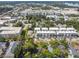 Aerial view showcasing a row of modern townhouses in a vibrant urban setting at 31 W Harding St, Orlando, FL 32806