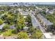 Aerial view of a house surrounded by trees and other buildings, showing neighborhood context at 31 W Harding St, Orlando, FL 32806
