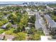 Aerial view of a house nestled in a vibrant neighborhood near a city skyline at 31 W Harding St, Orlando, FL 32806