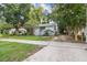 Home's exterior with a driveway and street view at 31 W Harding St, Orlando, FL 32806